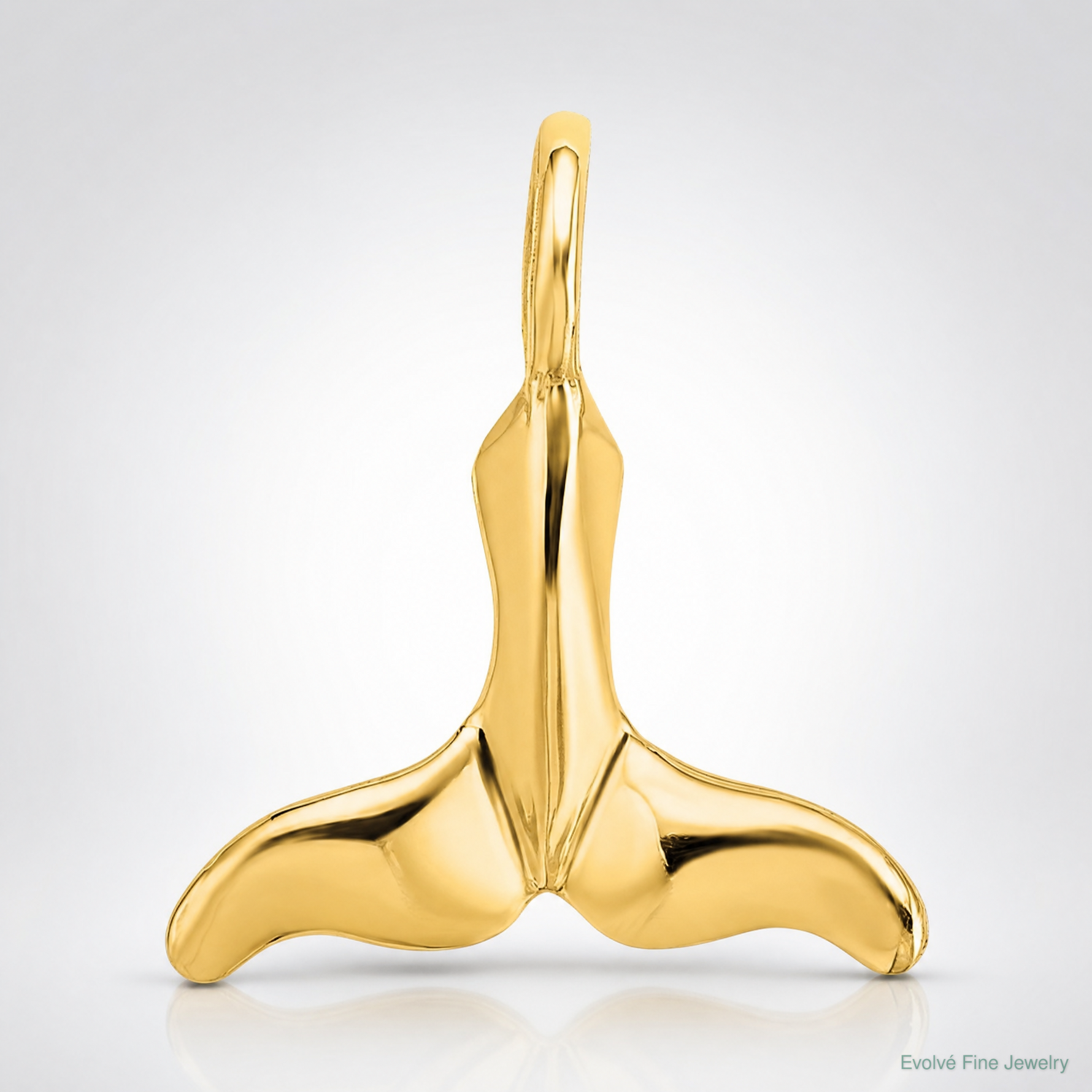 14K Polished Mini Whale Tail Charm - Lifestyle View