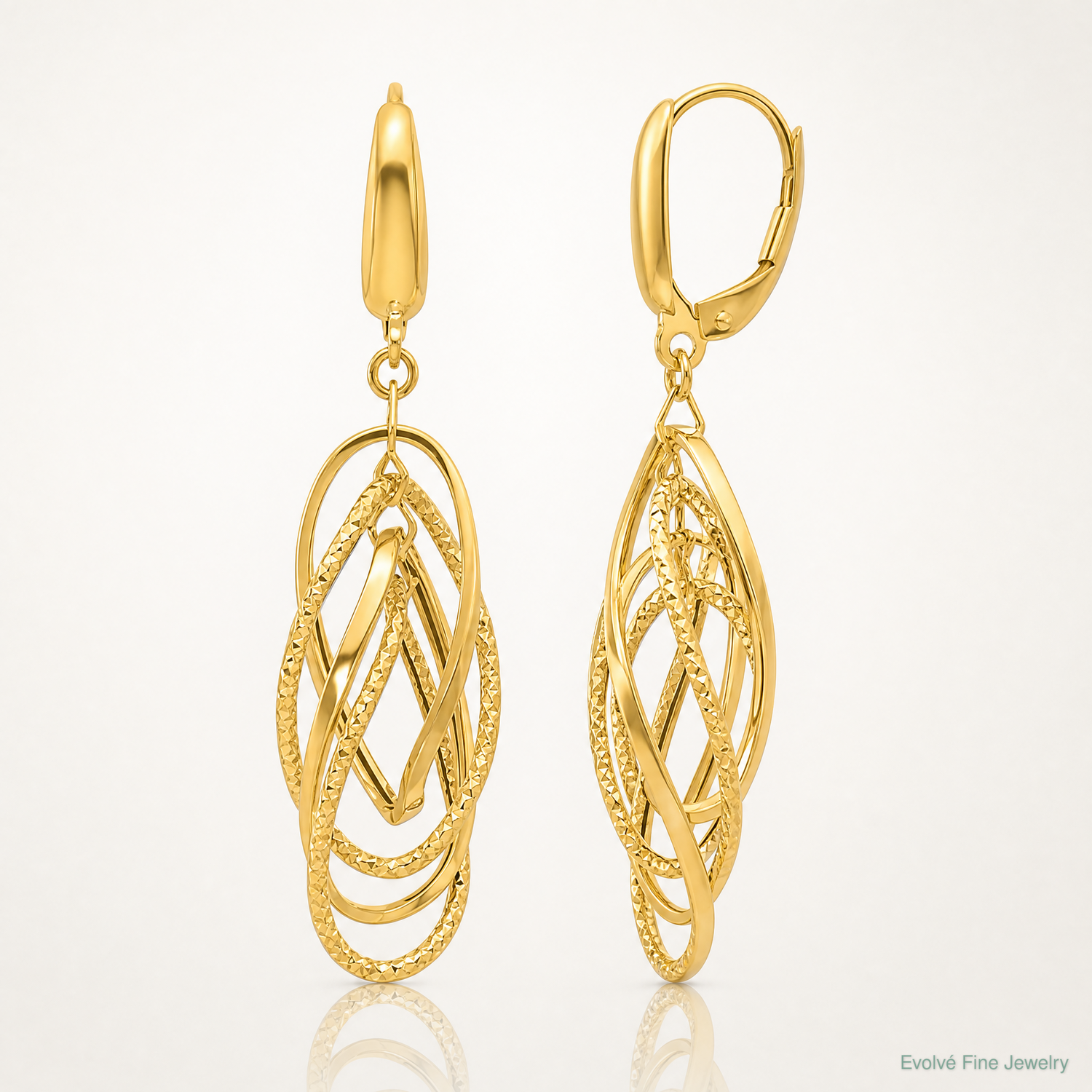Leslie's 14K Polished and Textured Ovals Dangle Earrings - Lifestyle View