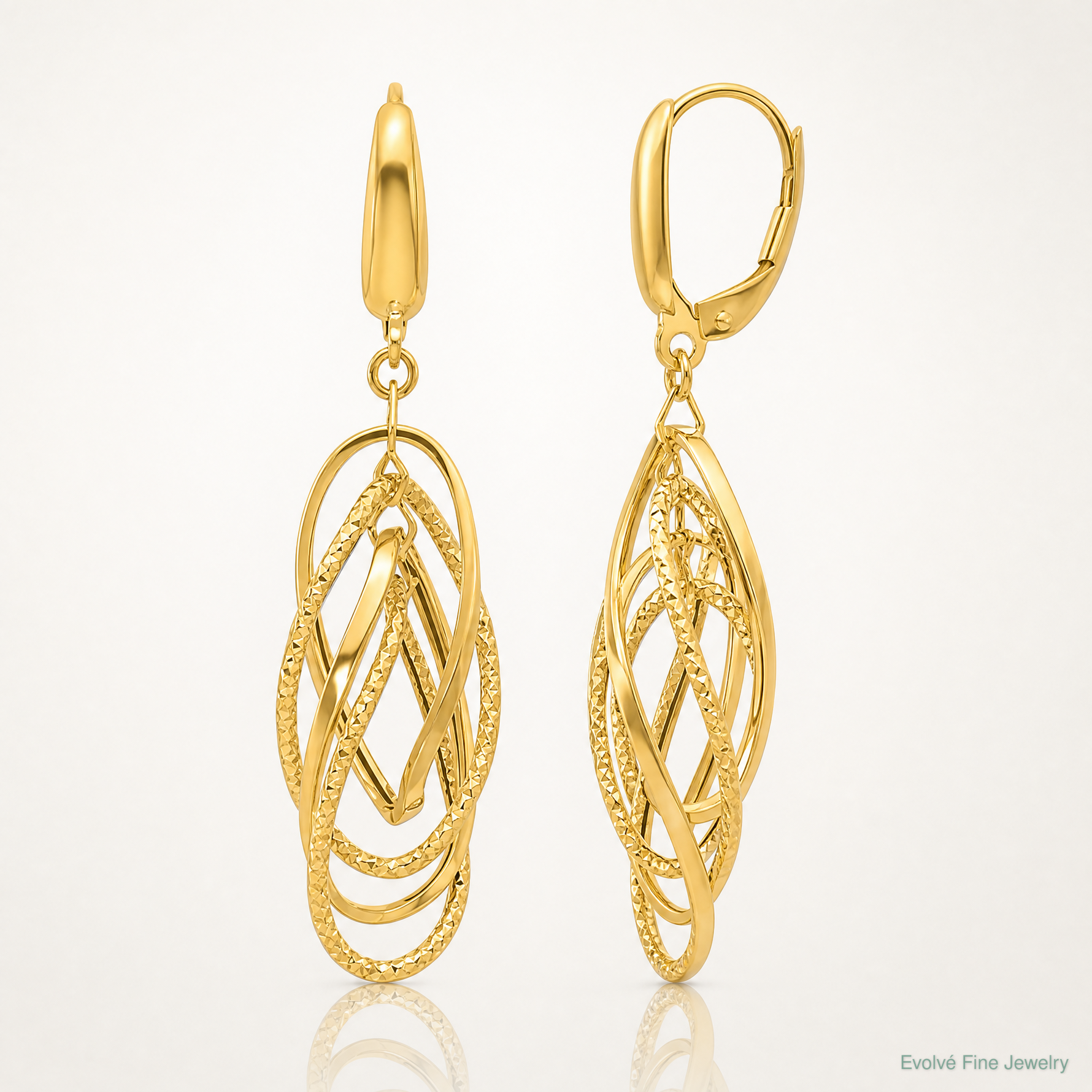 Leslie's 14K Polished and Textured Ovals Dangle Earrings - Lifestyle View