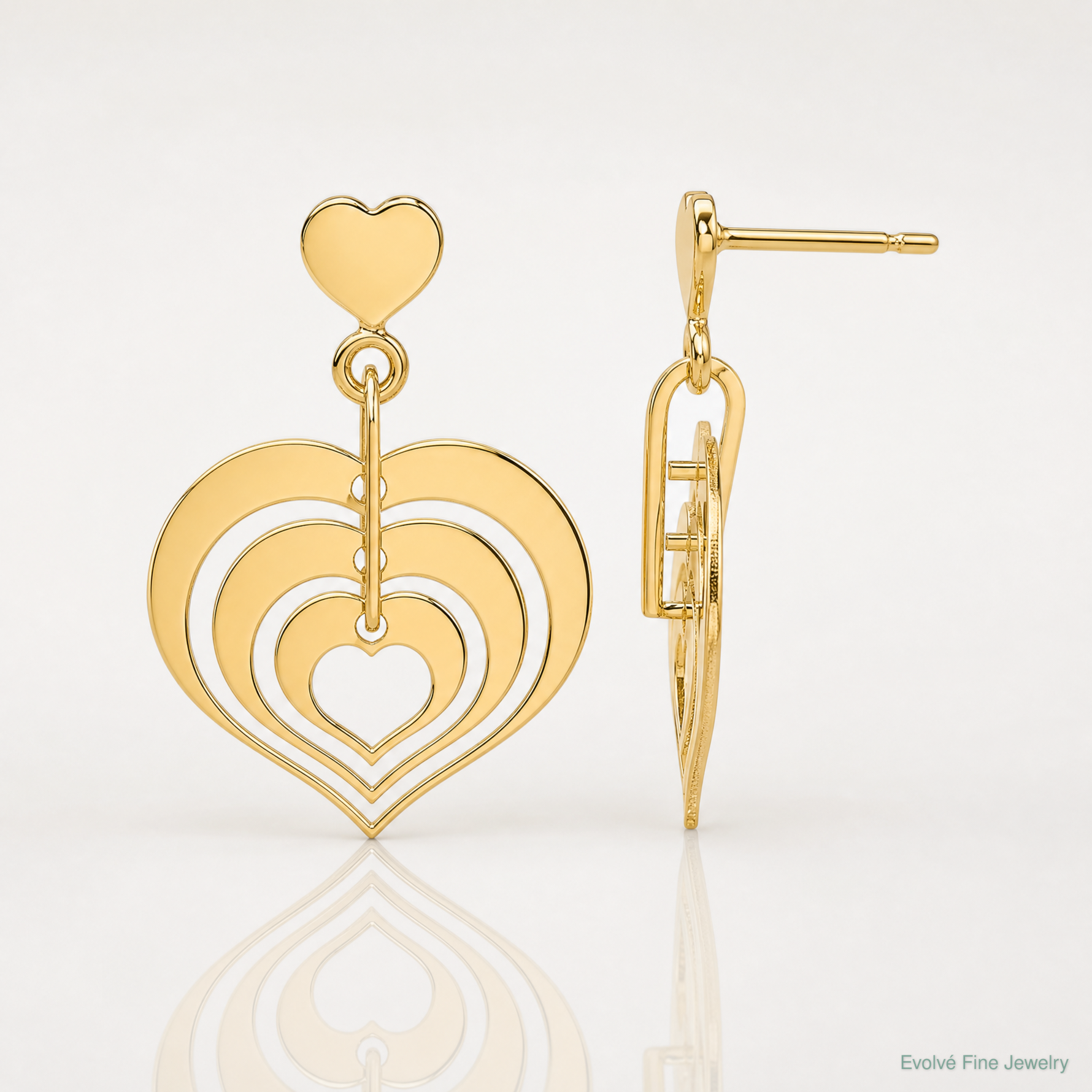 Leslie's 14K Polished Hearts Dangle Post Earrings - Lifestyle View