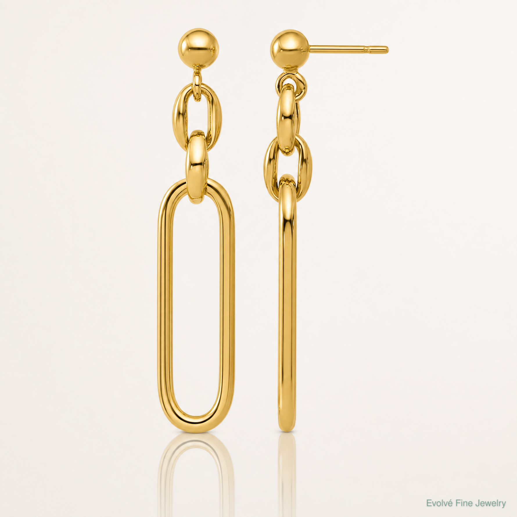 Leslie's 14K Polished Fancy Elongated Oval Link Post Dangle Earrings - Lifestyle View