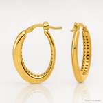 Leslie's 14K Polished Oval Hoop Earrings - Lifestyle View