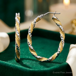 14k White Gold & Yellow Rhodium Twisted D/C Oval Hoop Earrings - Lifestyle View