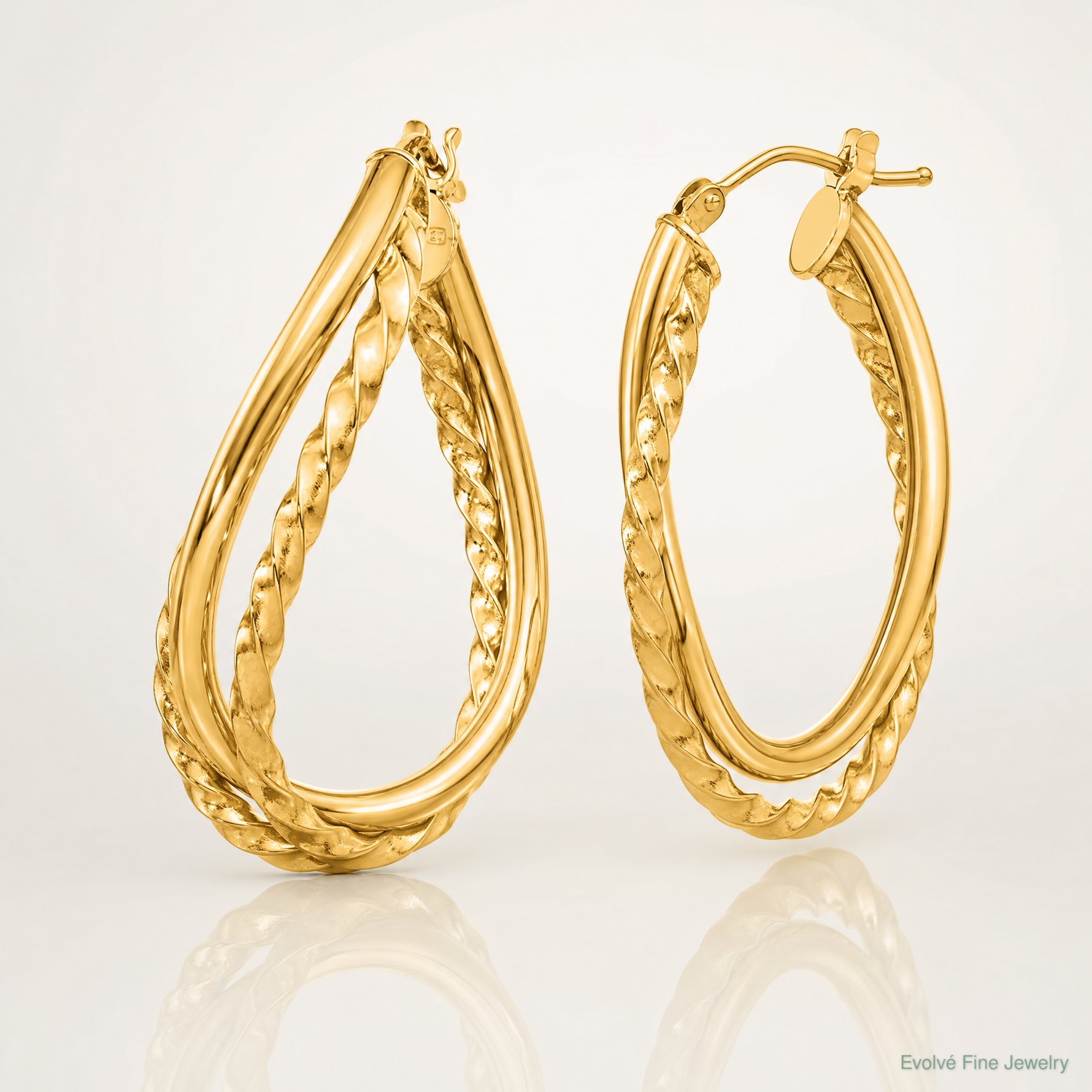 14k Textured and Polished Twist Oval Hoop Earrings - Lifestyle View