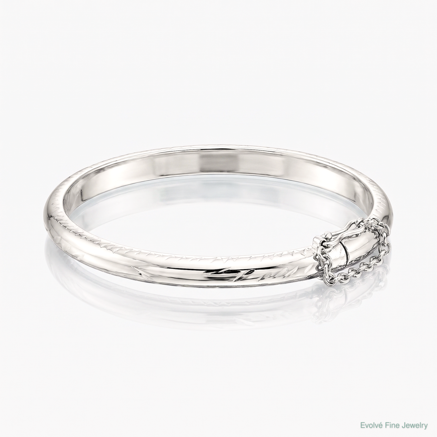 SS RH-plated Polished & D/C 4mm w/ Safety Hinged Children's Bangle - Lifestyle View
