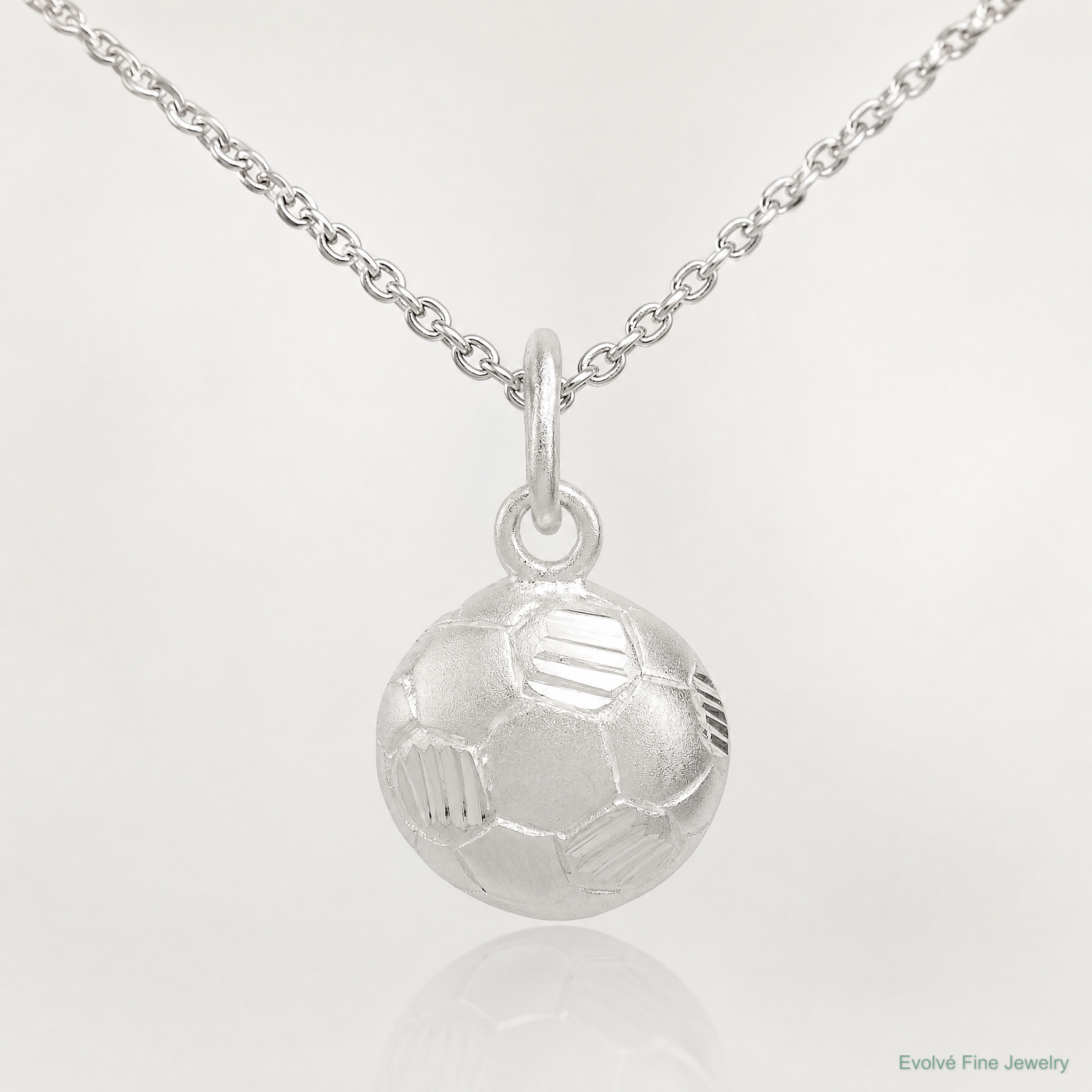 Sterling Silver Diamond Cut Soccer Ball Charm - Lifestyle View