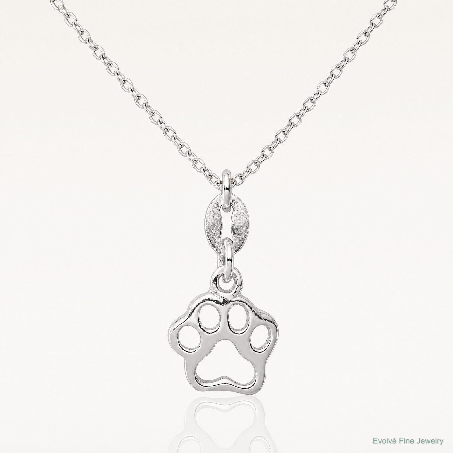Sterling Silver Polished Paw Print Charm - Lifestyle View