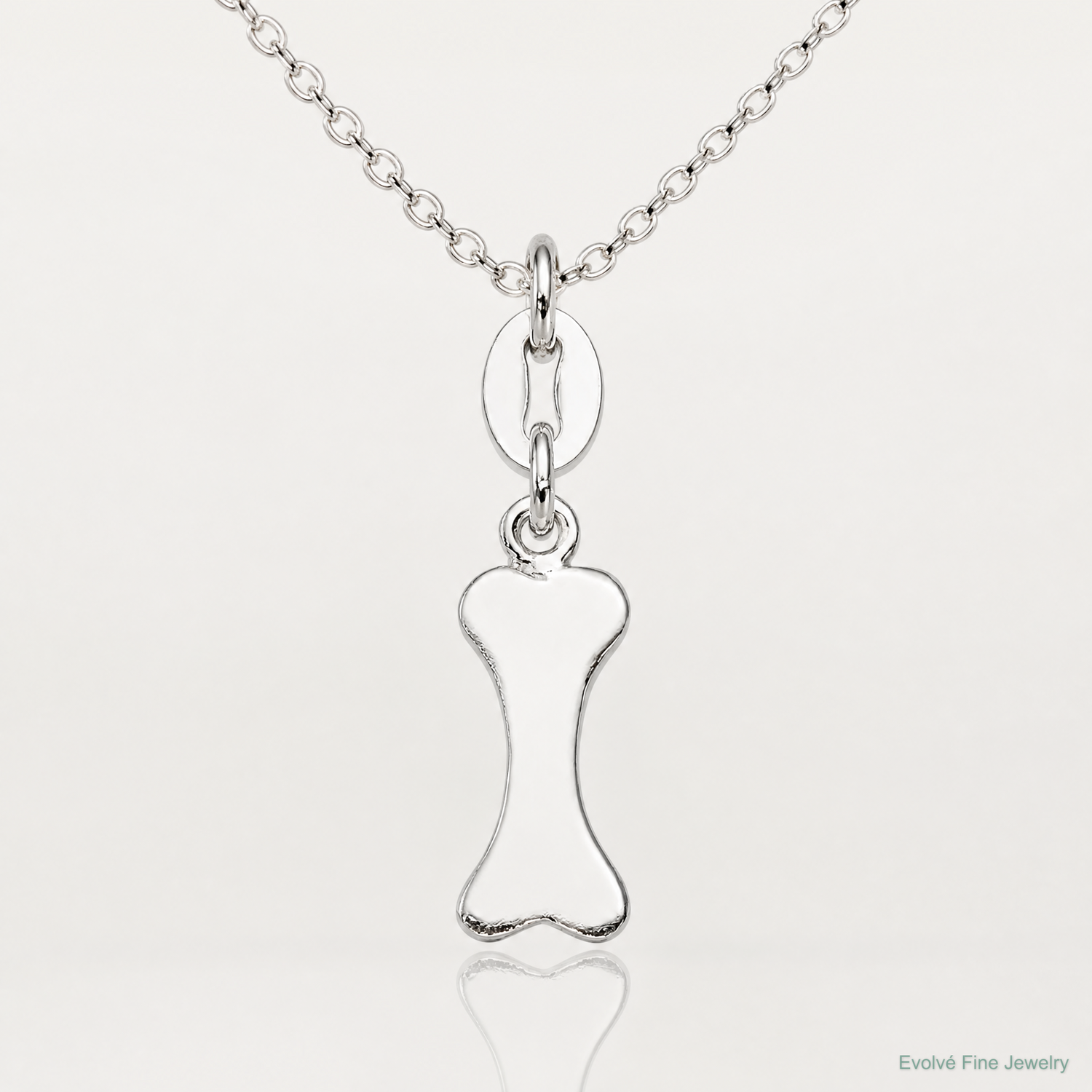 Sterling Silver Polished Dog Bone Charm - Lifestyle View