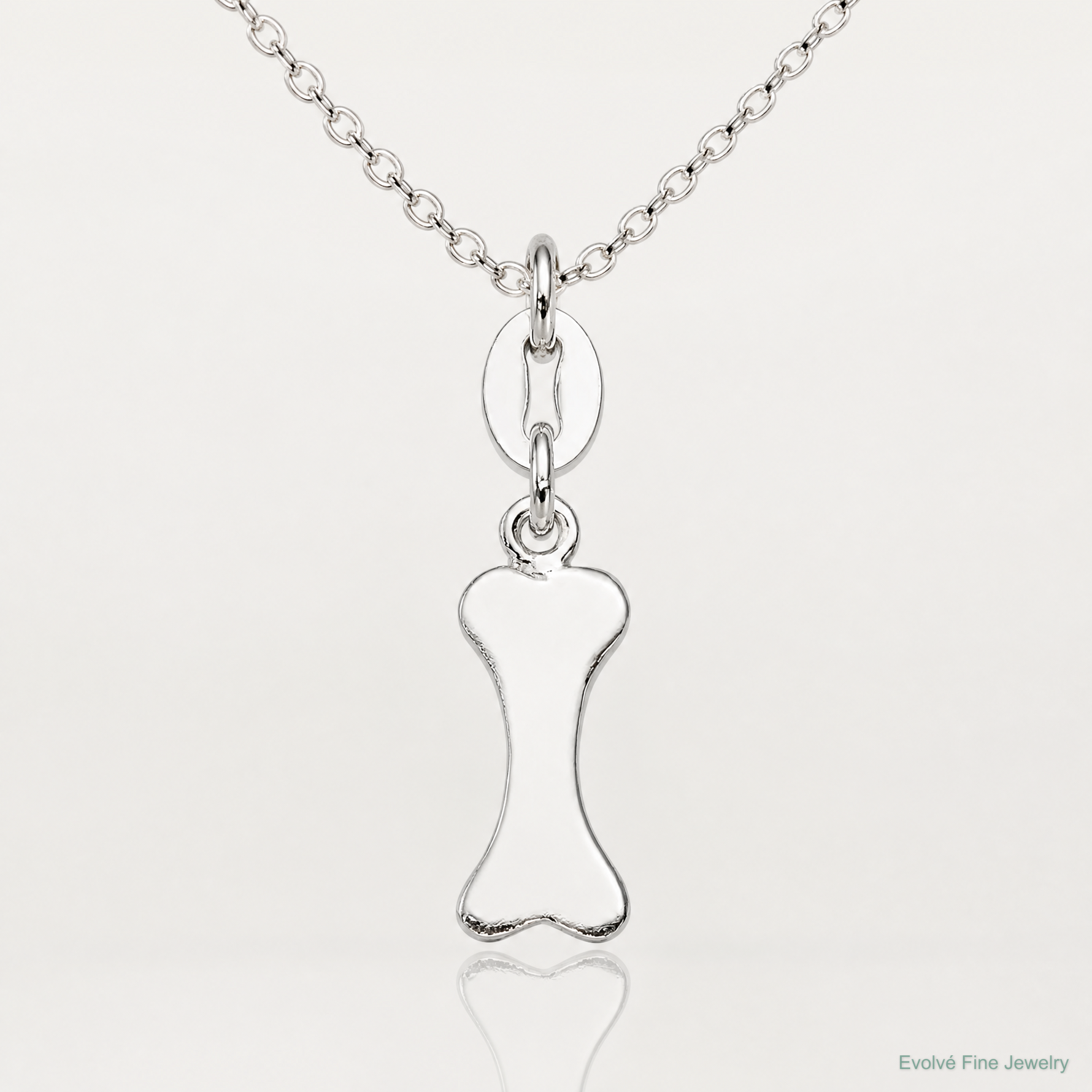 Sterling Silver Polished Dog Bone Charm - Lifestyle View