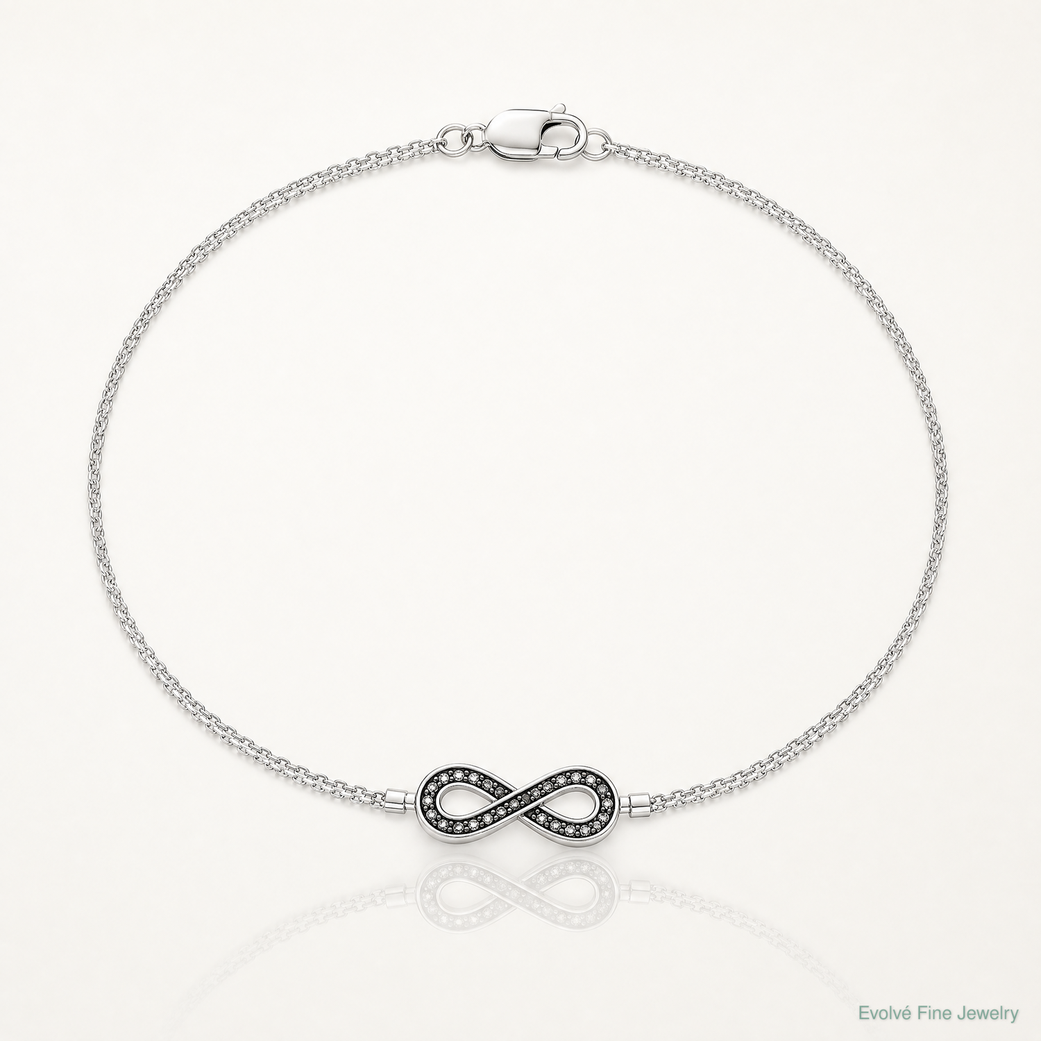 Sterling Silver Rhod 0.1ct. Blk/Wht Dia. Rvsble Infinty w/.5in ext. Bracele - Lifestyle View