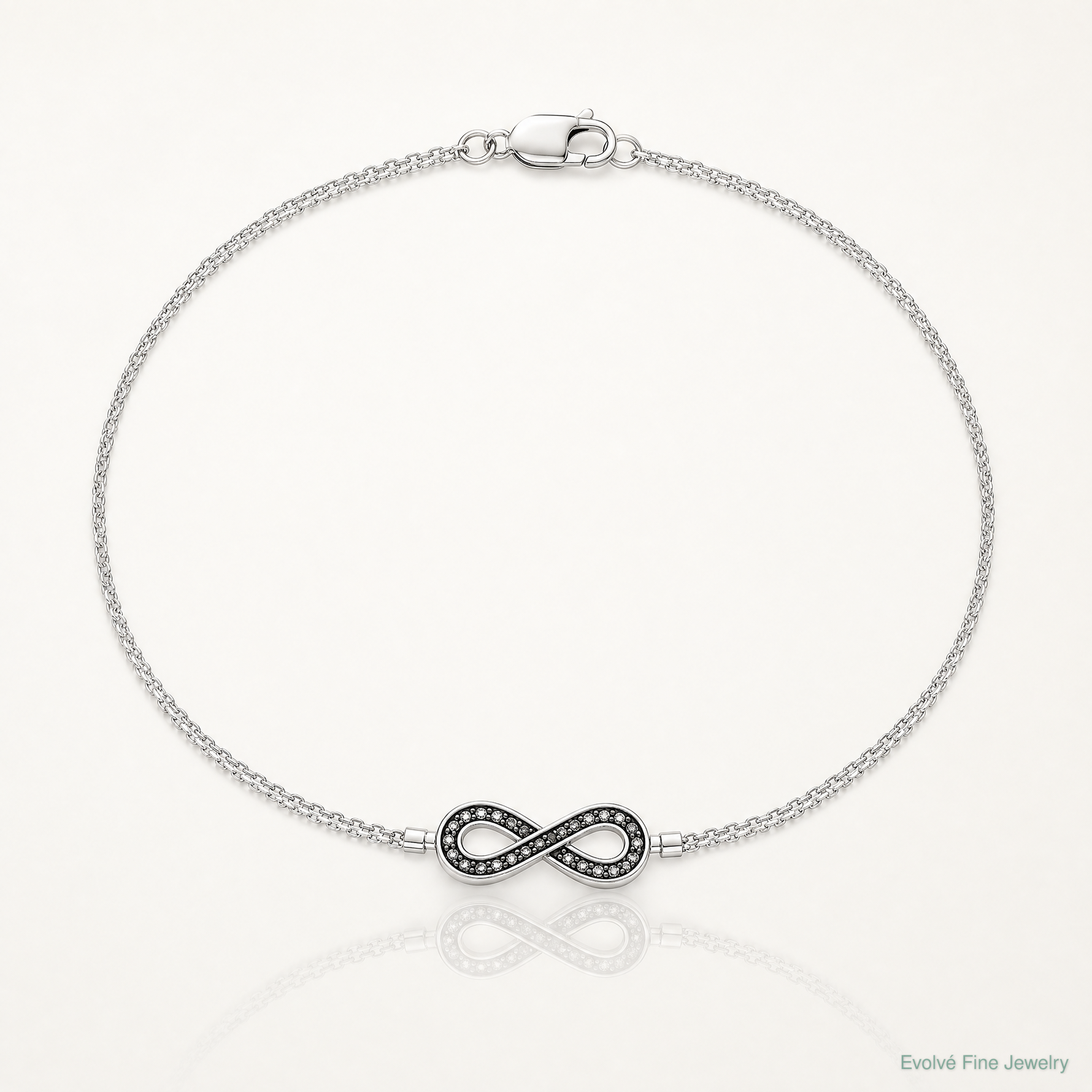 Sterling Silver Rhod 0.1ct. Blk/Wht Dia. Rvsble Infinty w/.5in ext. Bracele - Lifestyle View