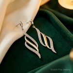 Sterling Silver Rhodium Plated Diamond Swirl Post Dangle Earrings - Lifestyle View
