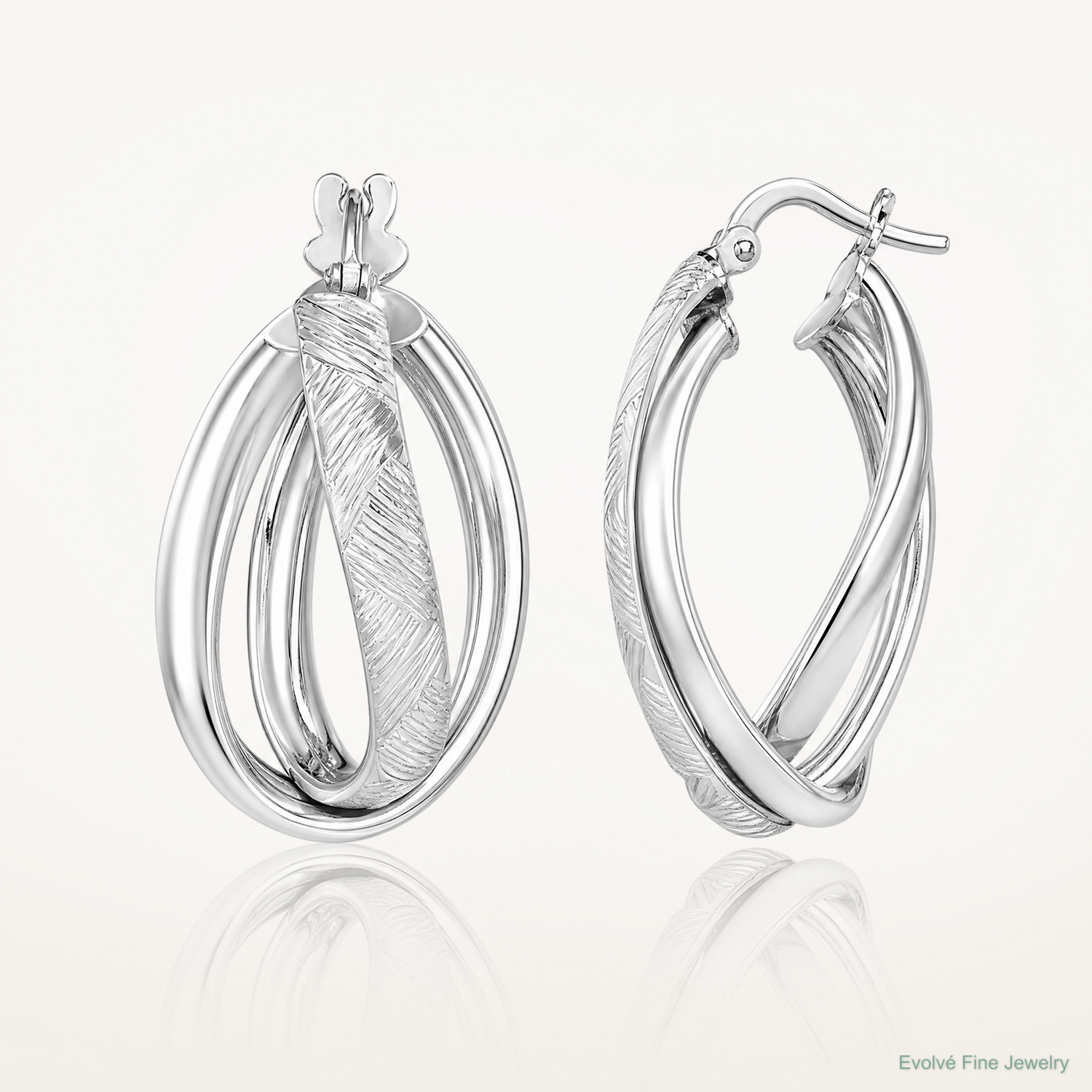Sterling Silver Rhodium-plated Textured & Twisted Oval Hoop Earrings - Lifestyle View