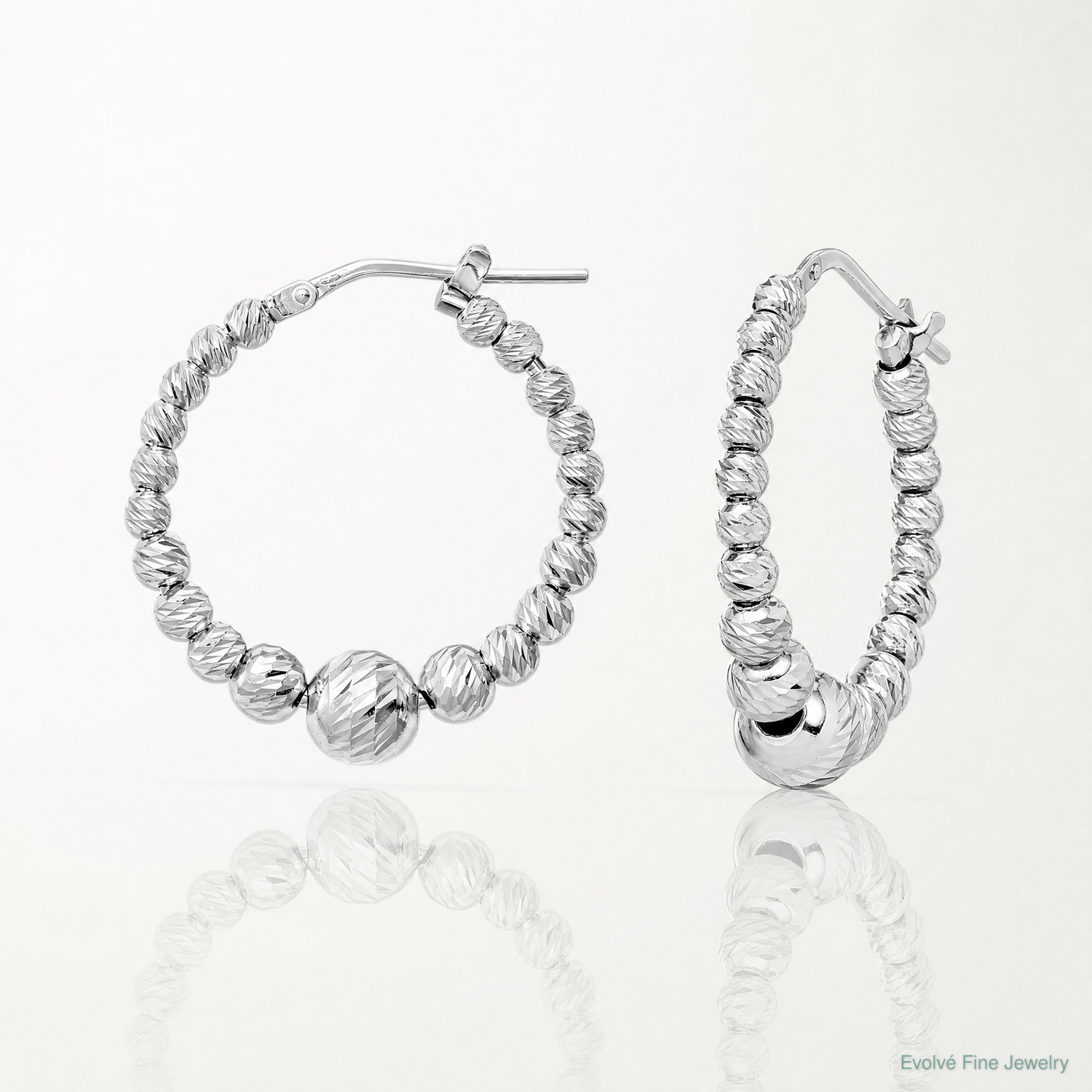 Sterling Silver Rhodium-plated Diamond-cut Beaded Hoop Earrings - Lifestyle View
