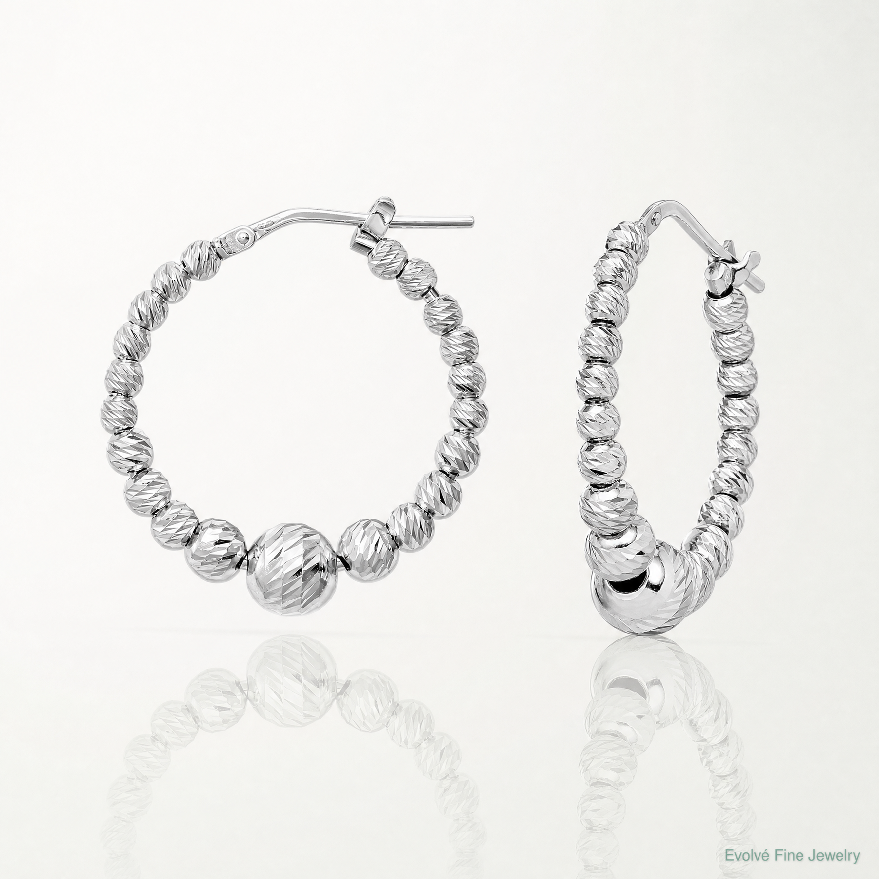 Sterling Silver Rhodium-plated Diamond-cut Beaded Hoop Earrings - Lifestyle View