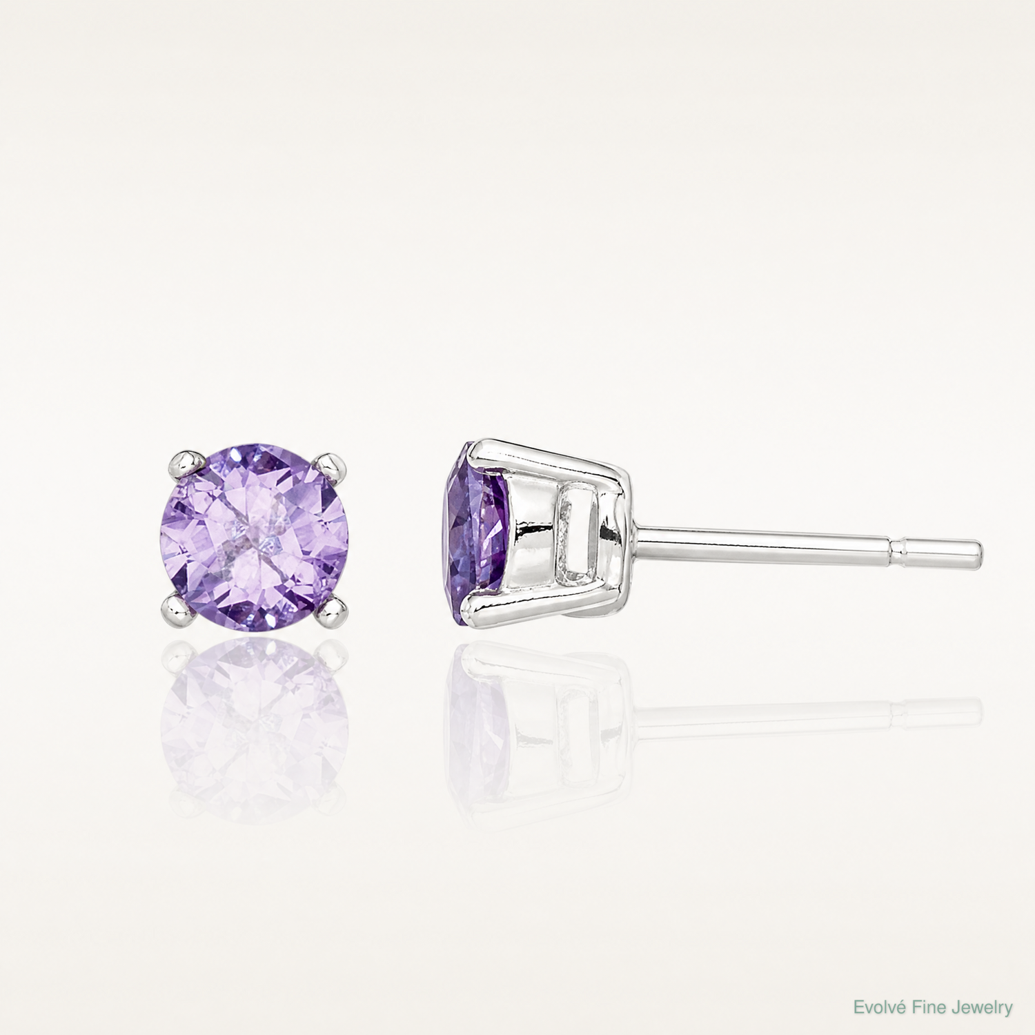 Sterling Silver Polished Round 4mm Purple CZ Stud Earrings - Lifestyle View