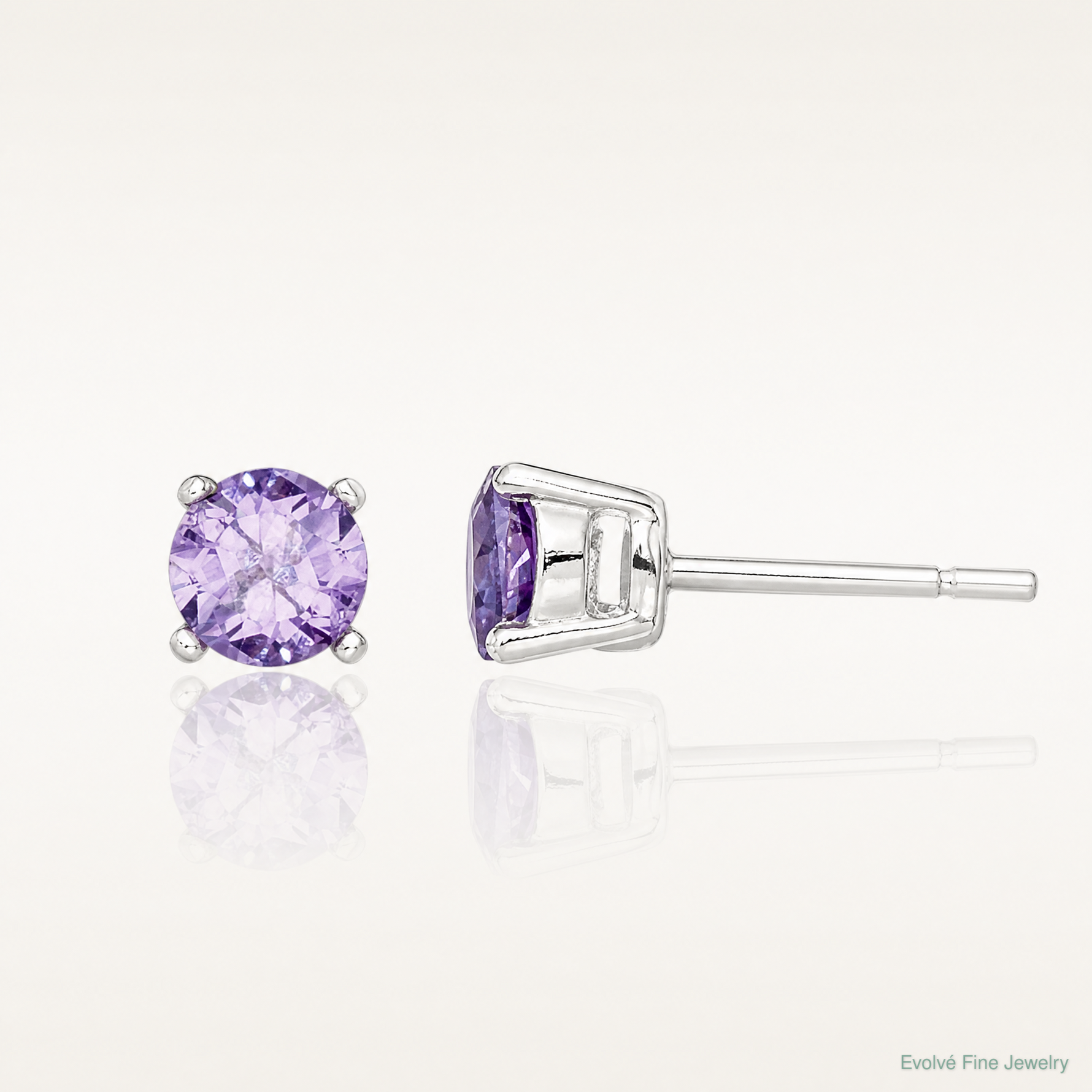 Sterling Silver Polished Round 4mm Purple CZ Stud Earrings - Lifestyle View