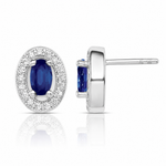 Sterling Silver Rhod-plated Blue and White CZ Oval Stud Earrings - Lifestyle View
