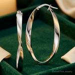 Sterling Silver Rhodium-plated Polished & Twisted Oval Hoop Earrings - Lifestyle View
