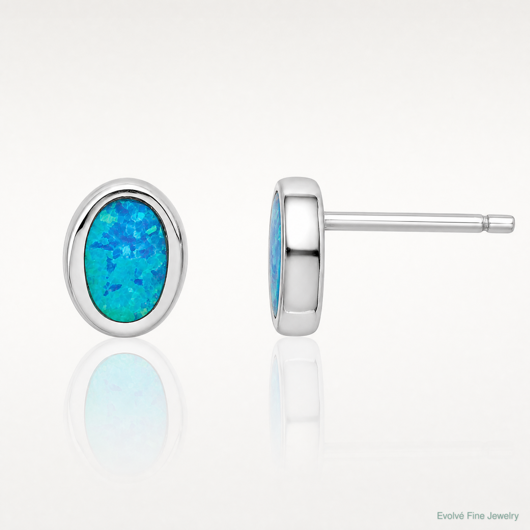 Sterling Silver RH-plated Polished Blue Created Opal Oval Stud Earrings - Lifestyle View