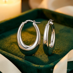 Sterling Silve Rhodium-plated Polished Hollow Oval Hoop Earrings - Lifestyle View