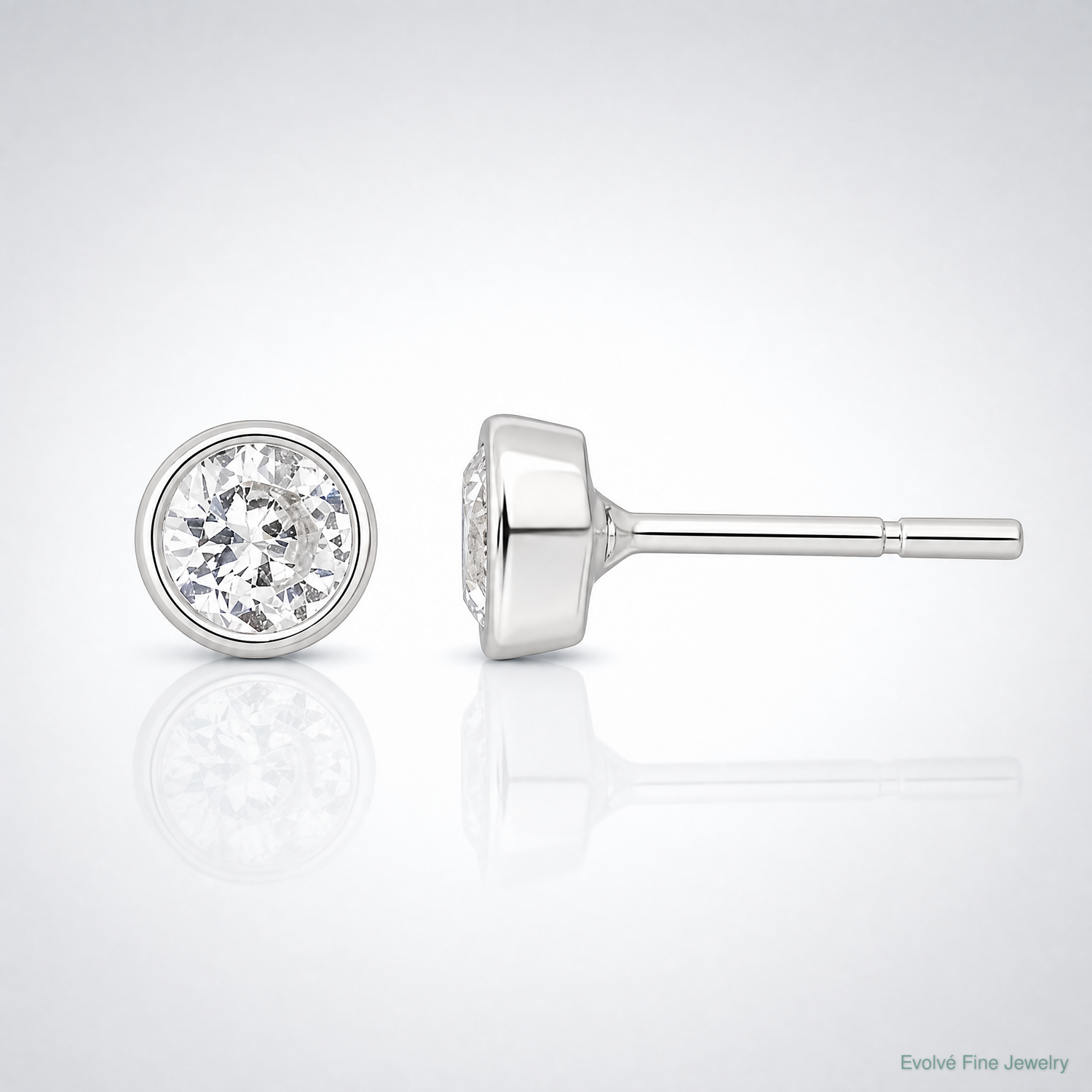 Sterling Silver Polished 4mm Round CZ Bezel Set Stud Earrings - Lifestyle View