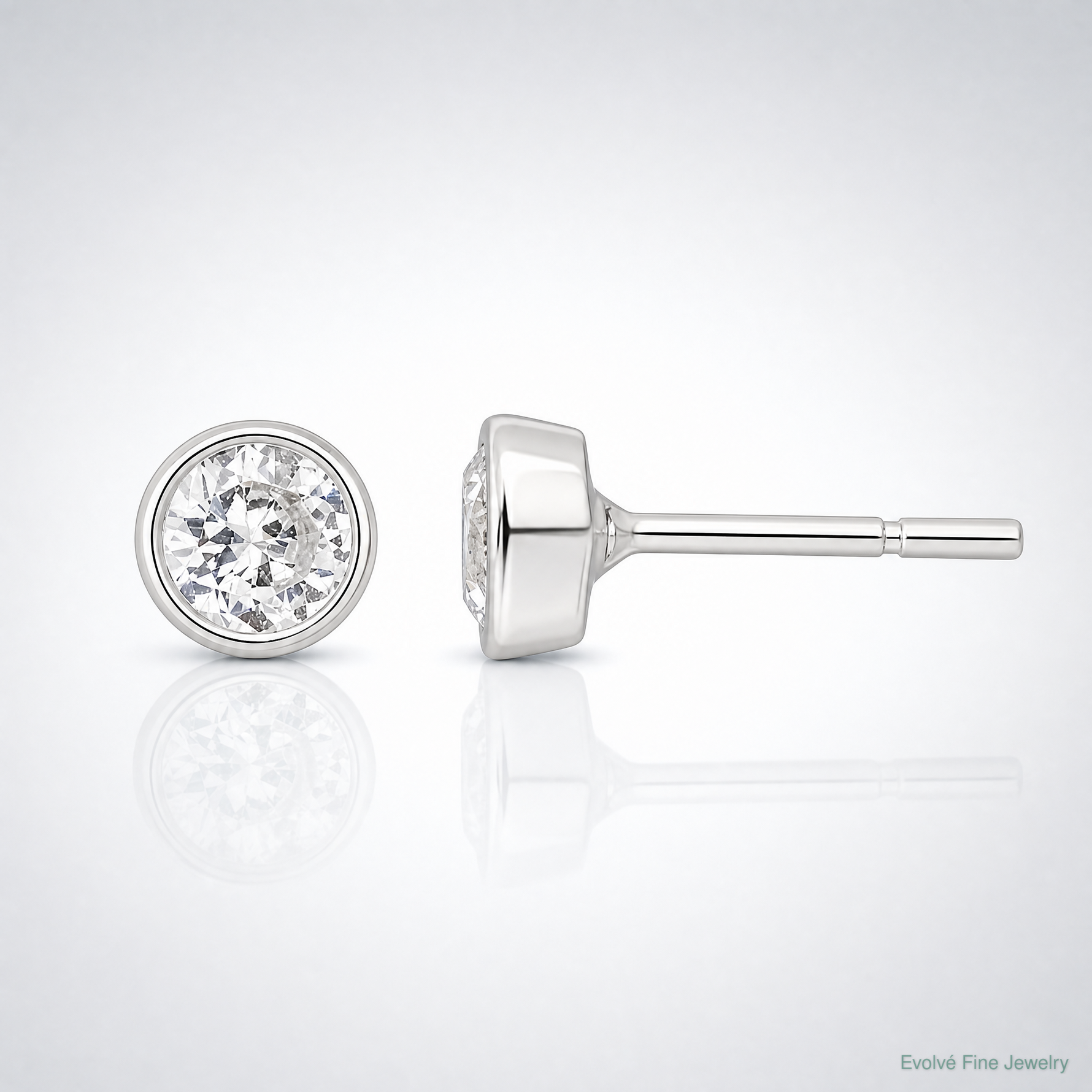 Sterling Silver Polished 4mm Round CZ Bezel Set Stud Earrings - Lifestyle View