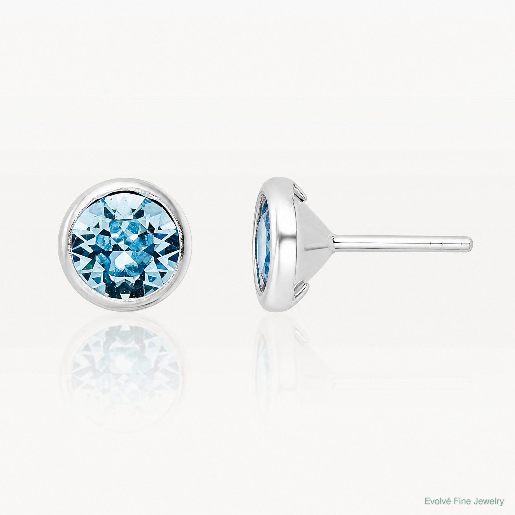 Sterling Silver Rhodium-plated Polished Blue Crystal Bezel Stud Earrings - Lifestyle View
