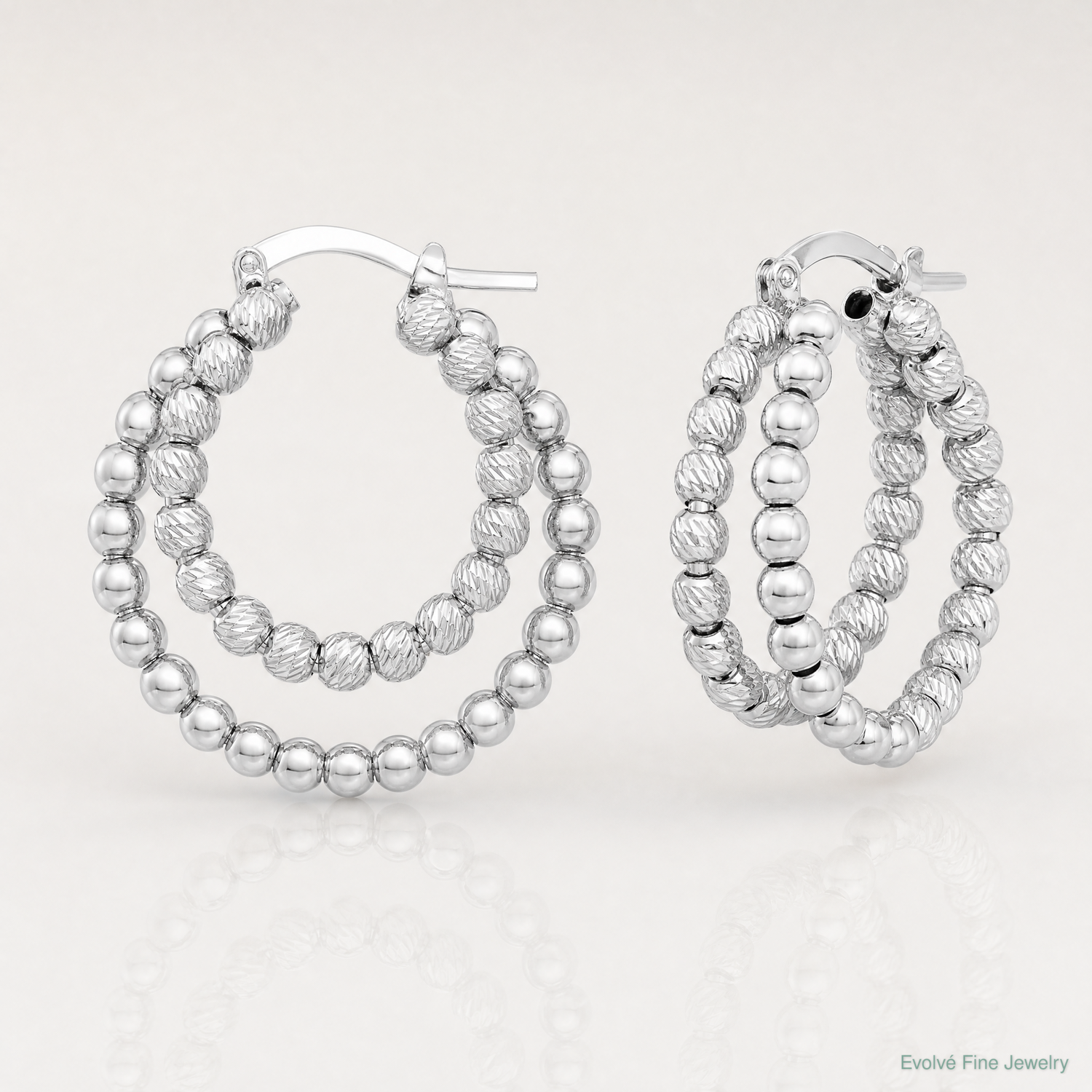 Sterling Silver Rhod-plated D/C Beaded Double Hoop Earrings - Lifestyle View