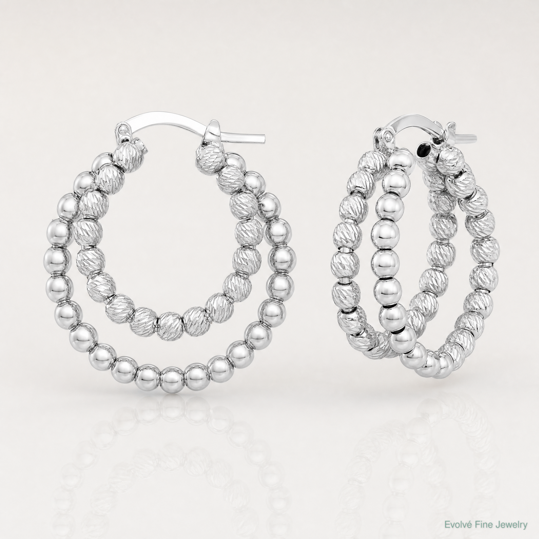 Sterling Silver Rhod-plated D/C Beaded Double Hoop Earrings - Lifestyle View