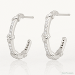 Sterling Silver E-Coating Polished CZ Knot C-Hoop Earrings - Lifestyle View