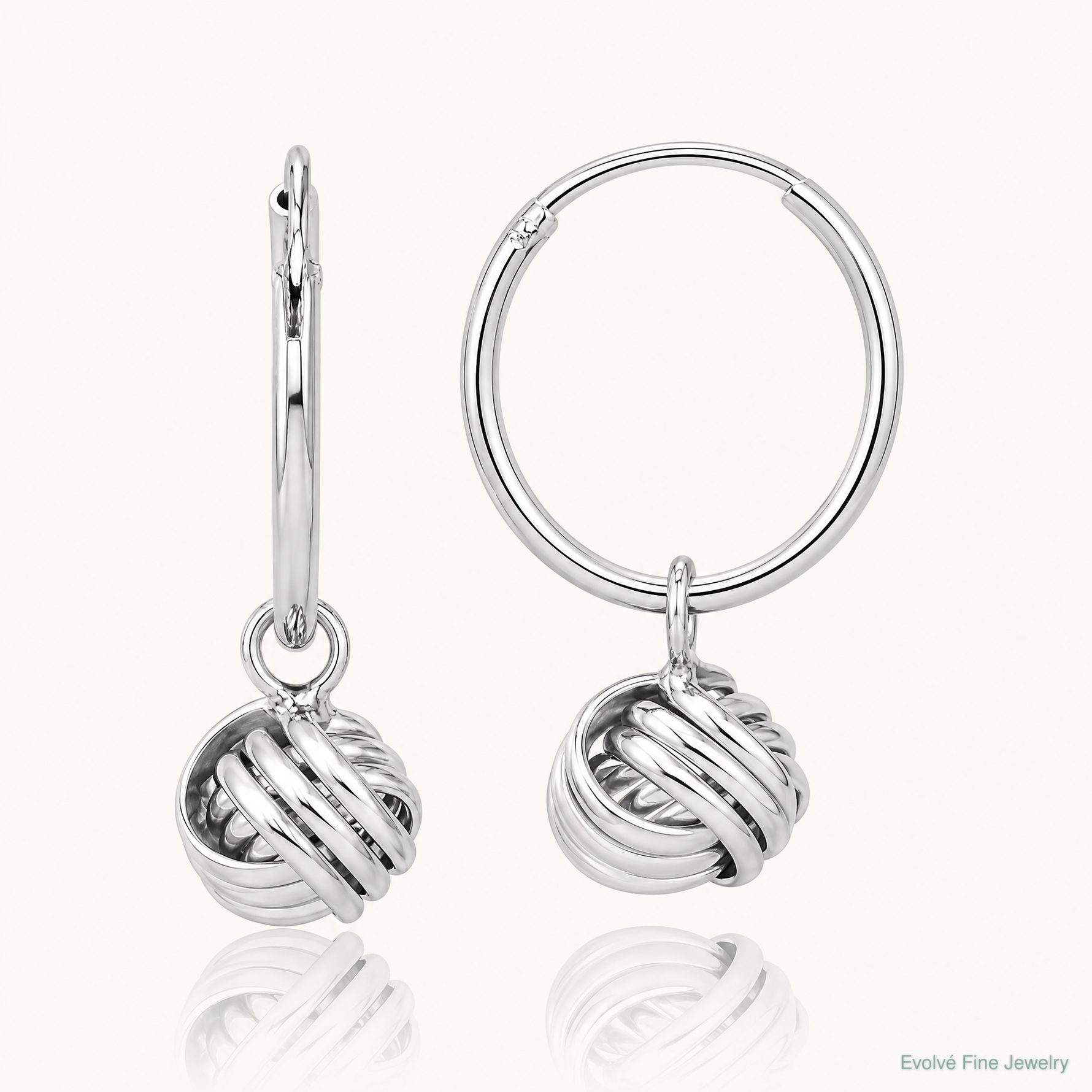 Sterling Silver Rhodium-plated Love Knot Dangle Eternity Hoop Earrings - Lifestyle View