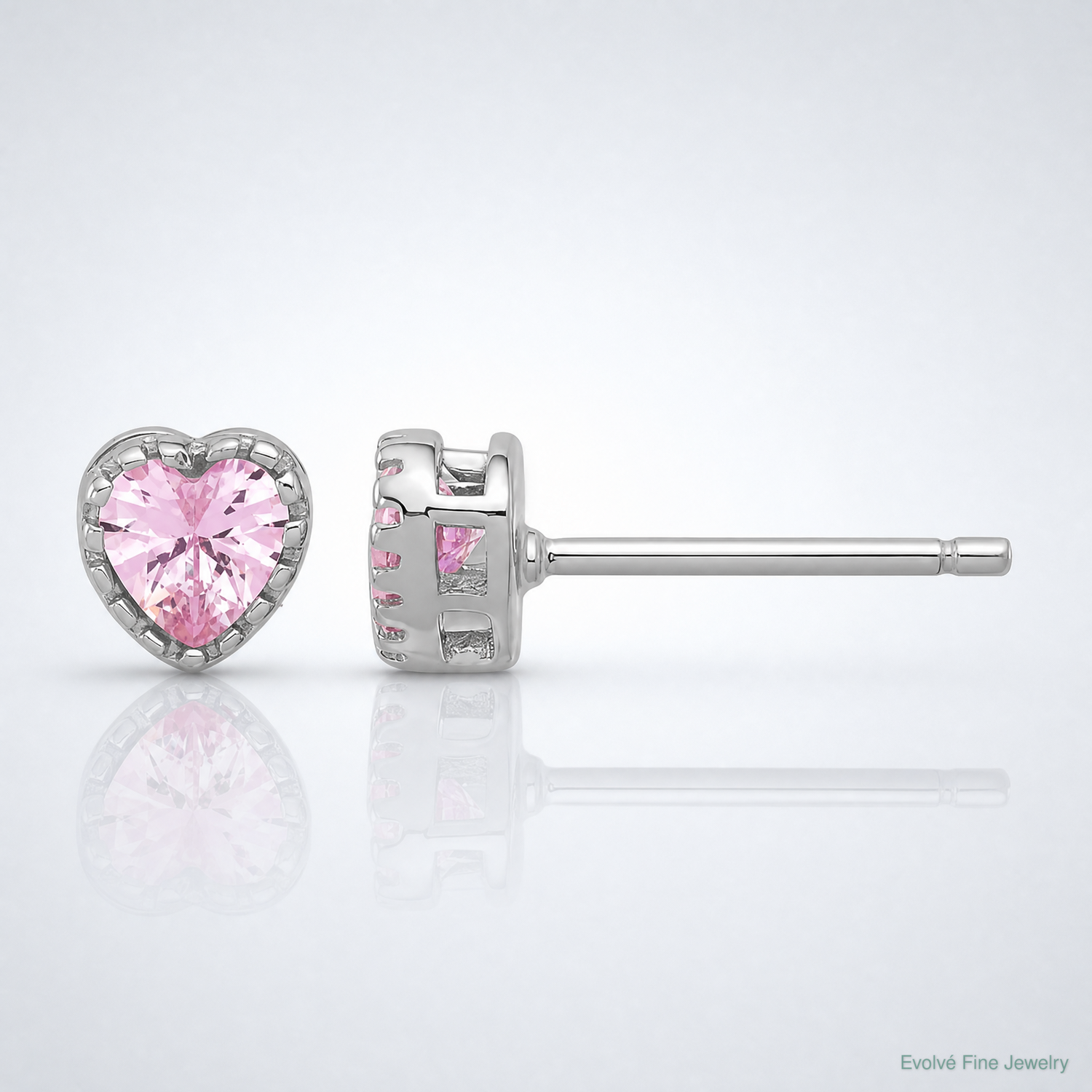Sterling Silver Rhodium-plated Pink CZ Heart Post Earrings - Lifestyle View
