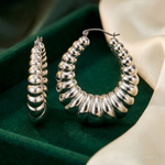 Sterling Silver Rhodium-plated Polished Shrimp Oval Hoop Earrings - Lifestyle View