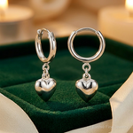 Sterling Silver Polished Puff Heart Dangle Hoop Earrings - Lifestyle View