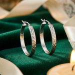 Sterling Silver Rhodium-plated Diamond-cut 4mm Oval Hoop Earrings - Lifestyle View