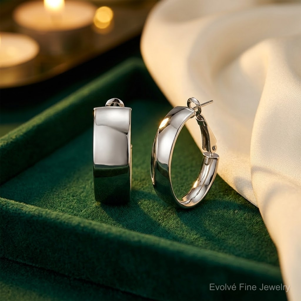 Sterling Silver Rhod-pltd Polish 10mm Omega Back Oval Hoop Earrings - Lifestyle View