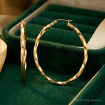 Sterling Silver Gold-plated Twisted 4mm Oval Hoop Earrings - Lifestyle View