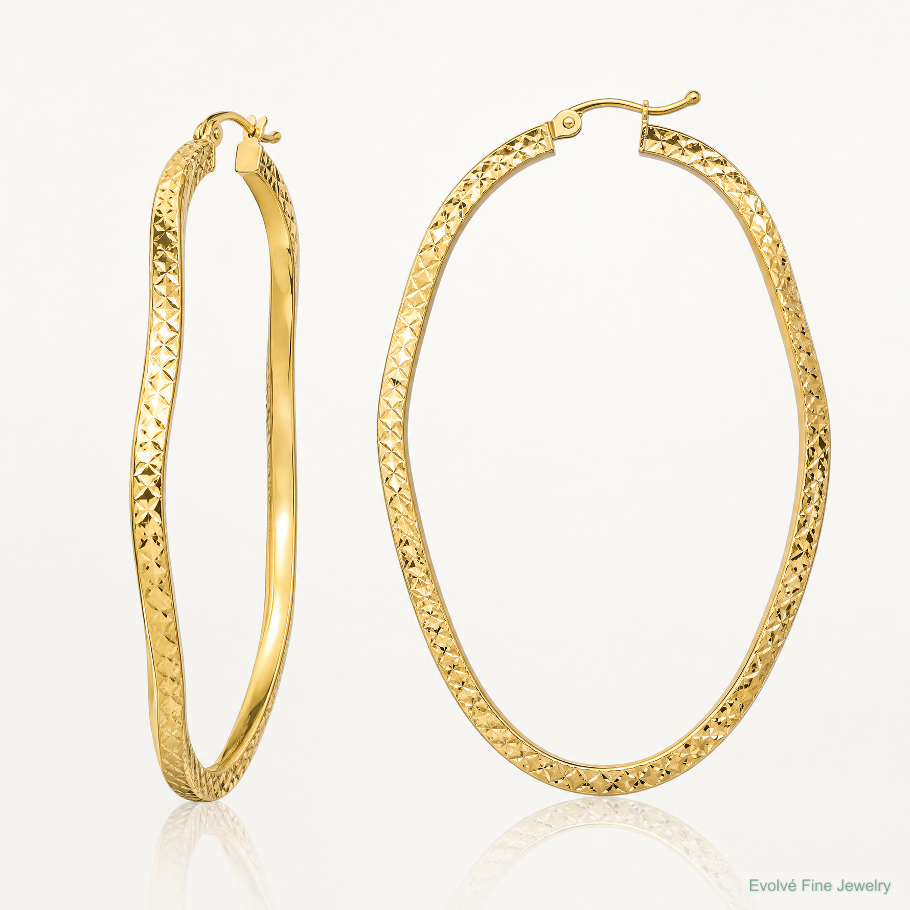 Sterling Silver Gold-plated Diamond Cut 2mm Wavy Hoop Earrings - Lifestyle View
