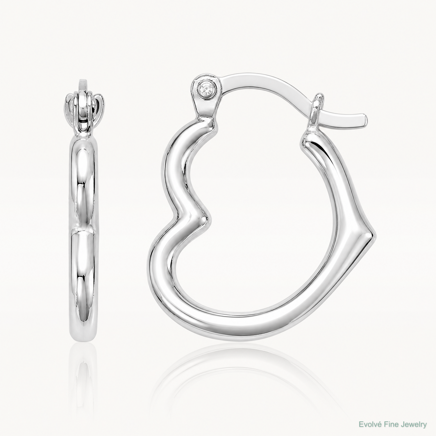 Sterling Silver Rhodium Plated Hollow Heart Hoop Earrings - Lifestyle View