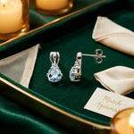 Sterling Silver Rhodium Plated Dia. Aquamarine Round Post Earrings - Lifestyle View