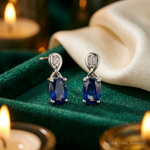 Sterling Silver Rhodium Plated Diamond & Sapphire Oval Post Earrings - Lifestyle View