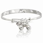 Sterling Silver D/C & Textured Bells Adjustable Children's Bangle Bracelet - Lifestyle View