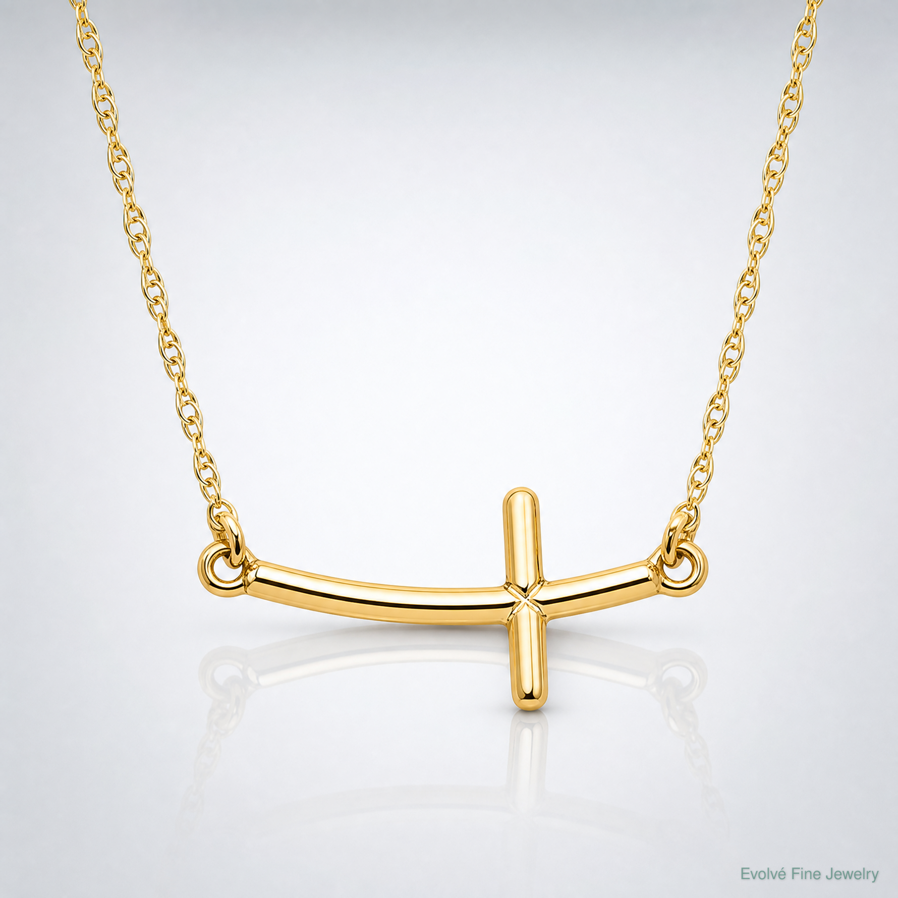 Sterling Silver YG-plated Small Sideways Curved Cross Necklace - Lifestyle View