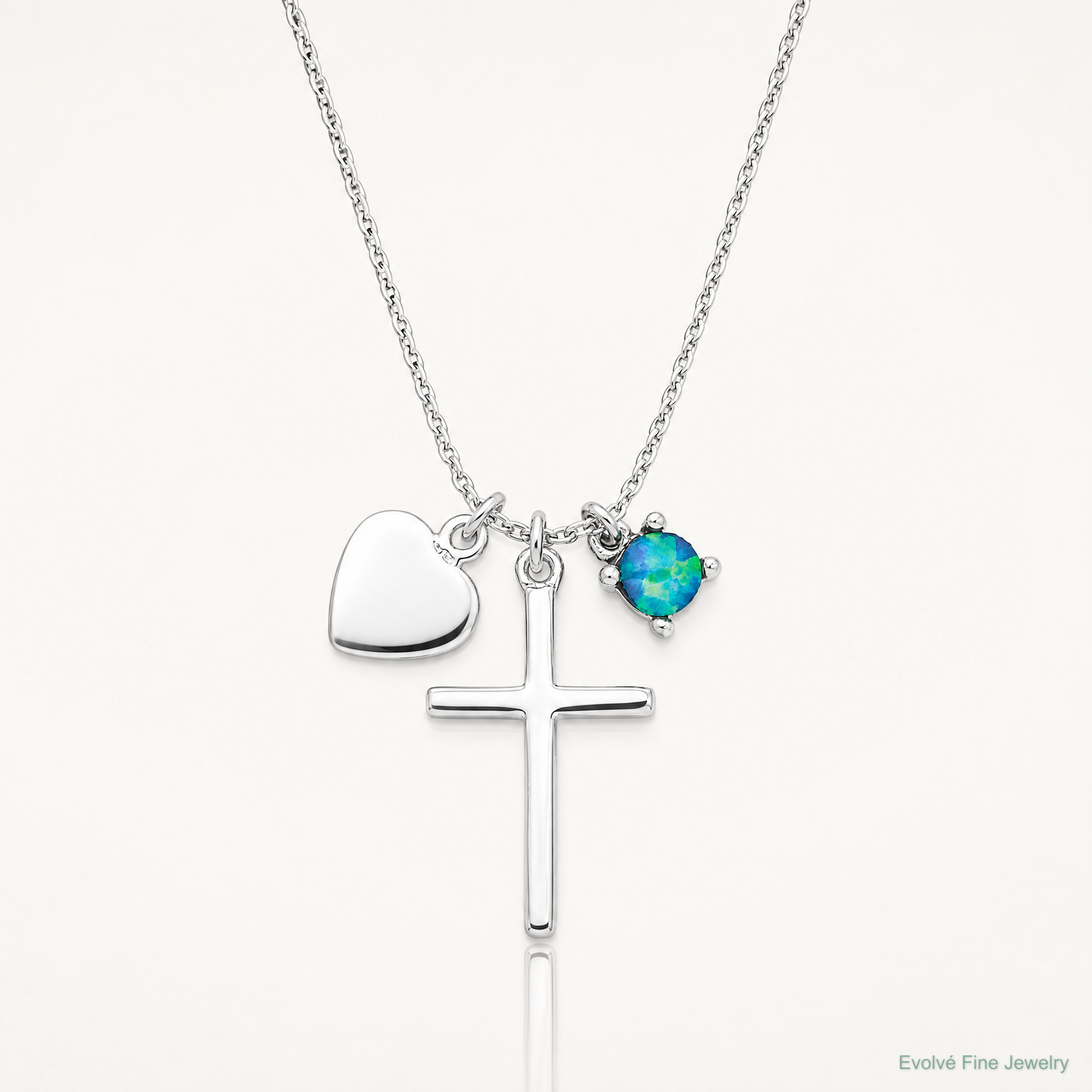 Sterling Silver Rhodium-plated Created Blue Opal Cross Necklace - Lifestyle View