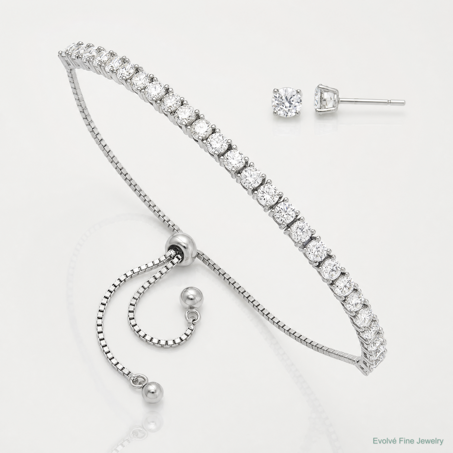 Sterling Silver Rhodium-plated CZ Adjustable Bracelet and Post Earring Set - Lifestyle View