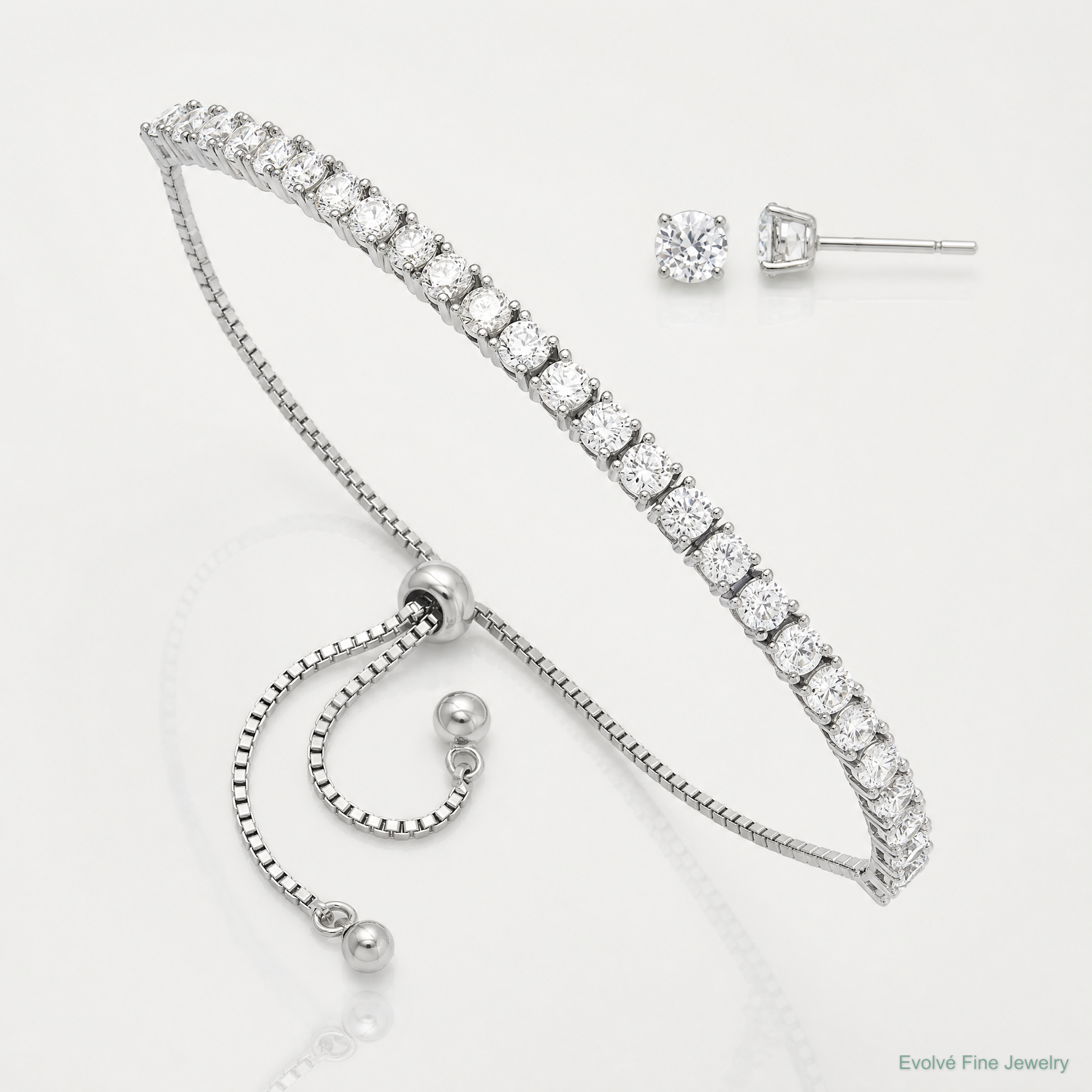 Sterling Silver Rhodium-plated CZ Adjustable Bracelet and Post Earring Set - Lifestyle View