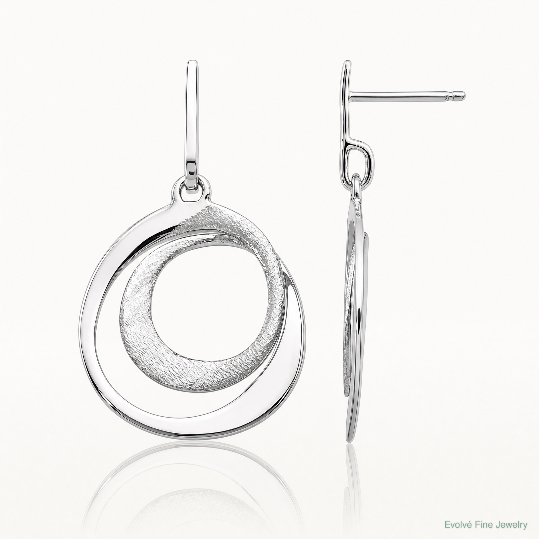 Leslie's SS RH-plated Radiant Essence Textured Post Dangle Earrings - Lifestyle View
