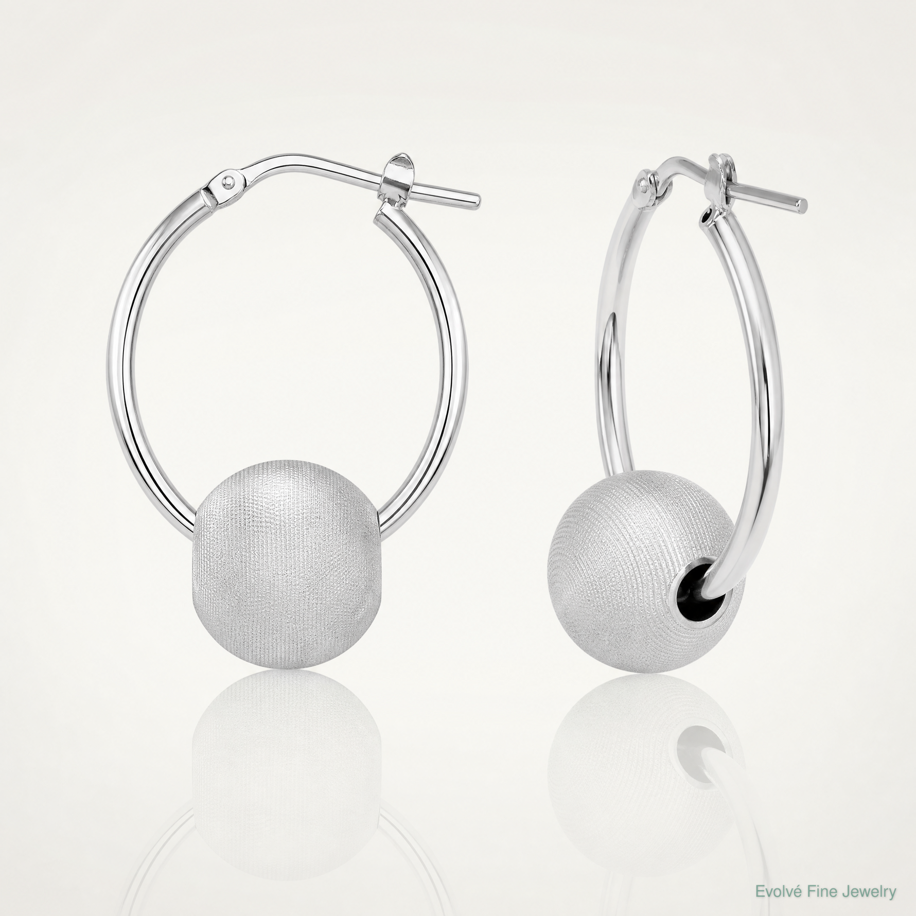 Leslie's SS RH-plated Radiant Essence Brushed & Polished Hoop Earrings - Lifestyle View