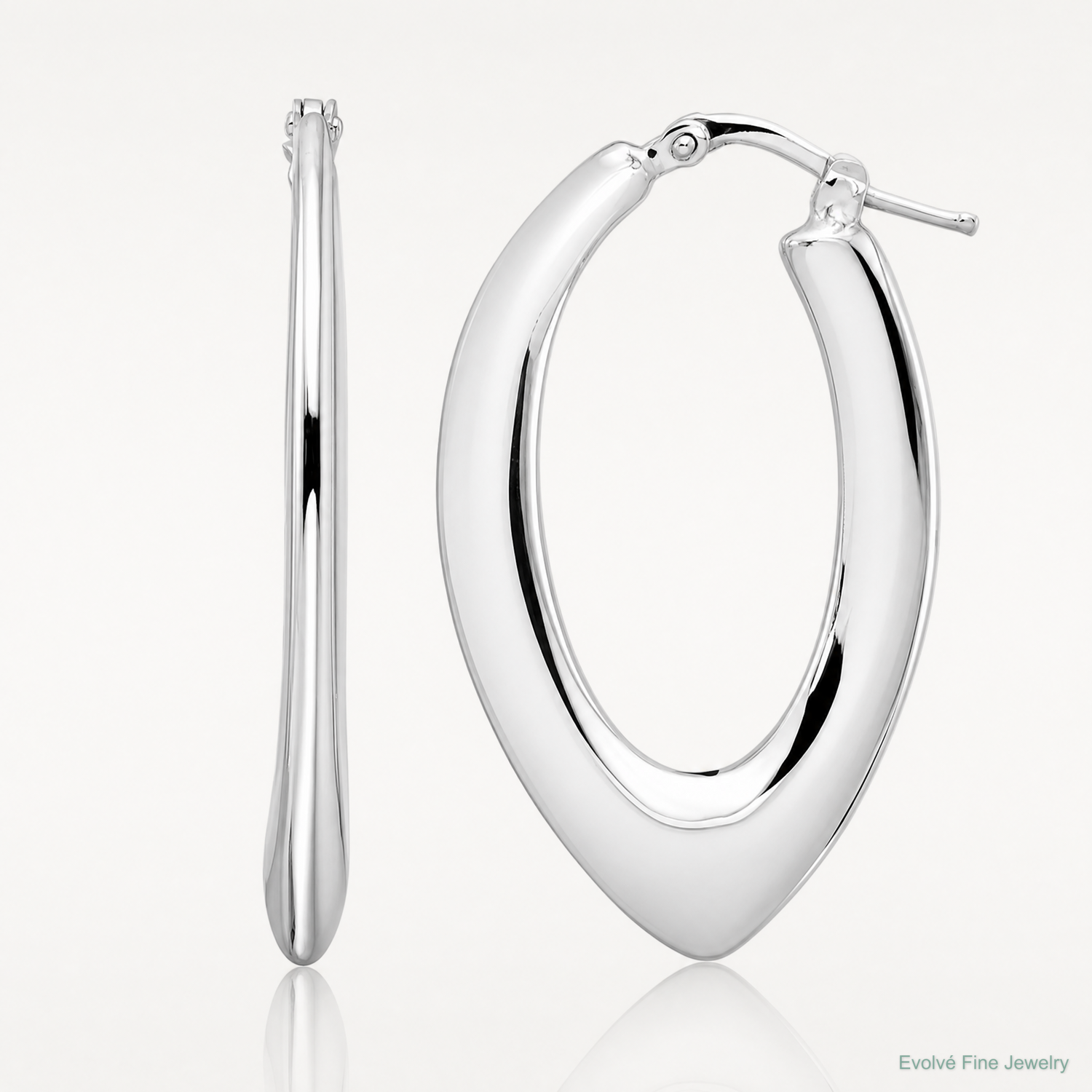 Leslie's Sterling Silver Rhod-plated Polished Oval Hoop Earrings - Lifestyle View